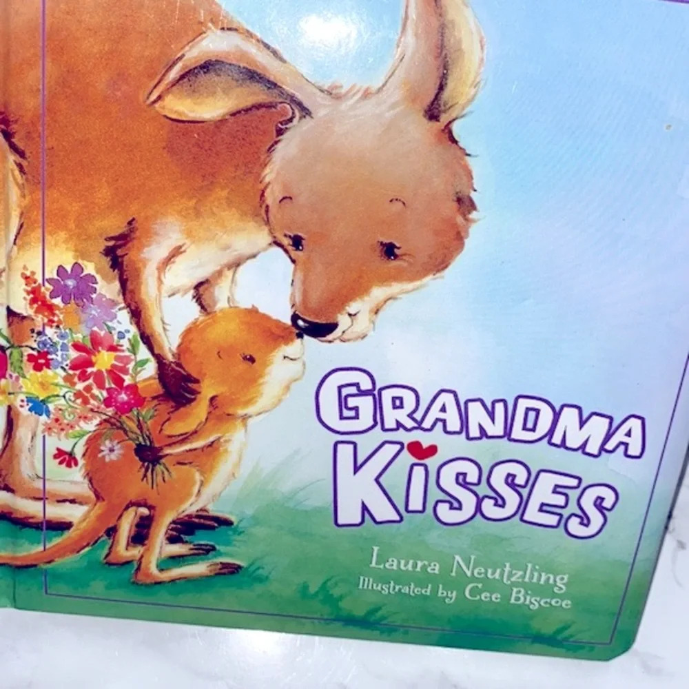 Grandma kisses children’s hardback story book